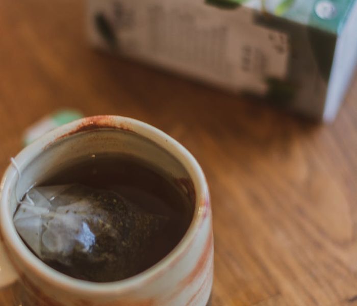 Peaceful morning routine with herbal tea representing wellness